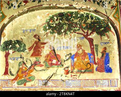 Murale vandalizzato e trascurato di Guru Nanak, Guru Angad, Bhai Bala, Bhai Mardana e Bhai Bhana con una mosca, da un samadh fatiscente situato vicino a Gurdwara Bhai Than Singh a Kot Fateh Khan, Attock, Punjab. Foto Stock