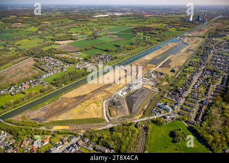 Vista aerea, Wasserstadt Aden, area di costruzione per il quartiere urbano progettato sul sito dell'ex miniera Haus Aden, cantiere, Weddinghof Foto Stock