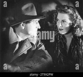 SHERLOCK HOLMES E LA VOCE DEL TERRORE 1942 Universal Pictures film con Basil Rathbone ed Evelyn Ankers Foto Stock