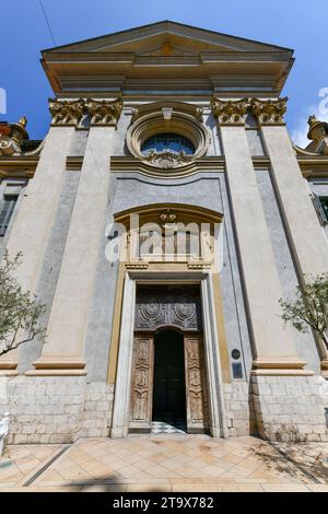 Chiesa di San Francesco di Paola nella storica città Vecchia di Vieille Ville, Nizza, Francia. Iscrizione in latino: "Una piccola carità per Foto Stock