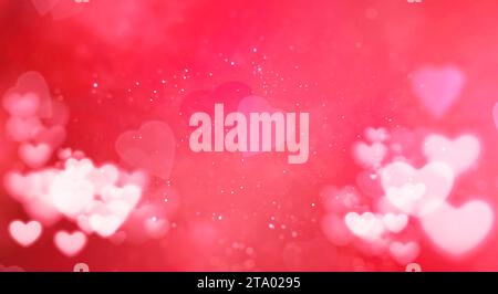 cuore bokeh rosso e bianco su sfondo rosa con scintillio di particelle, san valentino è perfetto per le feste Foto Stock