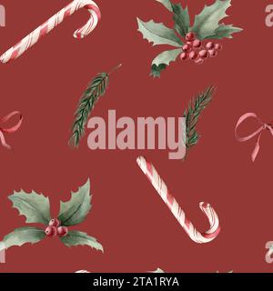 Motivo ad acquerello senza cuciture con canne caramelle, rametti di pino e fiocco di nastro rosso su sfondo rosso. Design natalizio per le vacanze invernali per tessuti, t Foto Stock