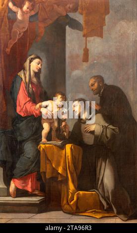 VICENZA, ITALIA - 5 NOVEMBRE 2023: Il dipinto della Madonna con la Santa Antonio di Padova e San Gaetan nella Chiesa di San Lorenzo Foto Stock