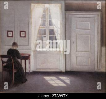 Vilhelm Hammershøi - Una stanza nella casa dell'artista a Strandgade, Copenaghen, con la moglie dell'artista Foto Stock