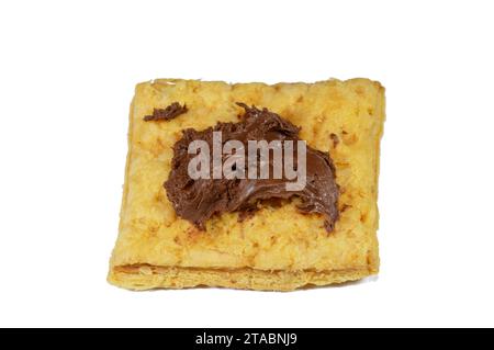 mille-feuille, millefeuille, Napoleone, vaniglia e fetta di crema pasticcera condita e ricoperta con crema di cioccolato alle nocciole, dessert francese a base di pasta sfoglia Foto Stock
