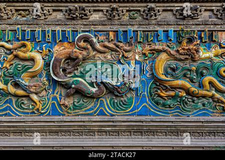 Il muro dei nove draghi di Pingyao in Cina Foto Stock