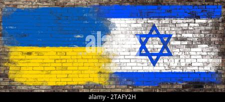 Relazioni internazionali. Bandiere nazionali di Ucraina e Israele dipinte su un muro di mattoni, con un disegno di striscioni Foto Stock