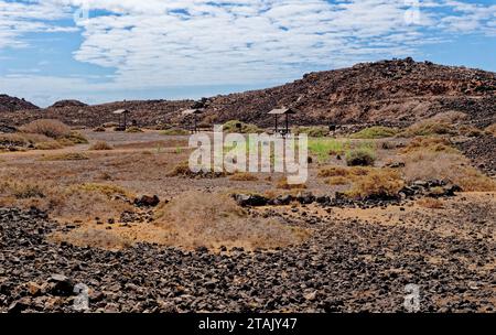 Attraversa il tipico paesaggio vulcanico lunare dell'Islote de Lobos. Isola di Lobos - Fuerteventura, Isole Canarie, Spagna - 24.09.2023 Foto Stock