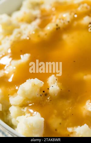 Salsa di tacchino fatta in casa e purè di patate con burro Foto Stock