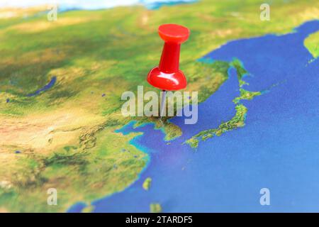 Pin Corea del Nord sulla mappa Foto Stock