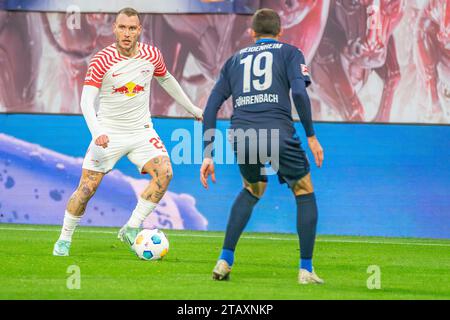 Lipsia, Deutschland 02. Dicembre 2023: 1.BL - 2023/2024 - RB Leipzig vs. 1.FC Heidenheim IM Bild: David Raum (Lipsia) //// le normative DFL vietano qualsiasi uso di fotografie come sequenze di immagini e/o quasi-video. /// Foto Stock