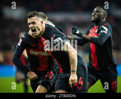 Leverkusen, Germania. 3 dicembre 2023. Torjubel: Florian Wirtz (Leverkusen), Granit Xhaka (Leverkusen), Victor Boniface (Leverkusen) Bayer Leverkusen - Foto Stock