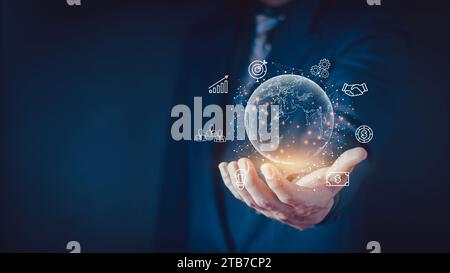Uomo d'affari detiene la connessione di rete analisi globale dei big data e concetto di business intelligence, punti e concetti della mappa mondiale, elementi di bus globale Foto Stock
