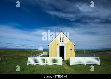 Case sull'isola Flatey, la più grande isola delle isole occidentali, situate a Breidafjordur nella parte nord-occidentale dell'Islanda; l'Islanda Foto Stock