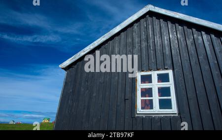 Case sull'isola Flatey, la più grande isola delle isole occidentali, situate a Breidafjordur nella parte nord-occidentale dell'Islanda; l'Islanda Foto Stock