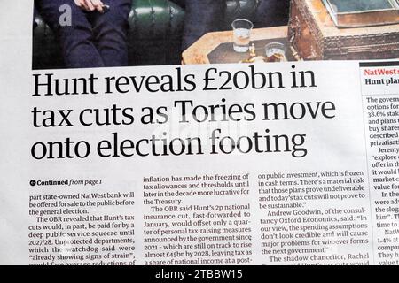 Jeremy 'Hunt rivela 20 miliardi di sterline di tagli fiscali mentre i Tories si spostano sulle basi elettorali" titolo del quotidiano Guardian Economy britannico 21 novembre 2023 Londra Regno Unito Foto Stock