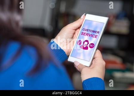 Lo schermo dello smartphone visualizza un concetto di servizio clienti Foto Stock