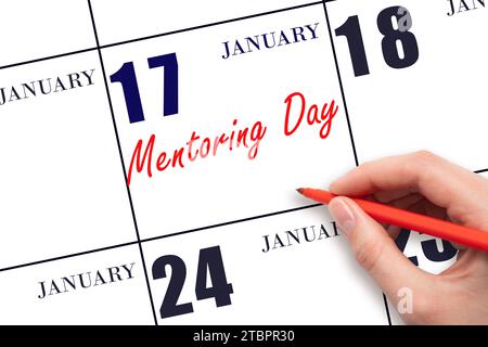 17 gennaio. Scrivere a mano il testo Mentoring Day nella data del calendario. Segnatevi la data. Vacanze. Concetto di giorno dell'anno. Foto Stock