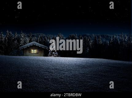 Rifugio invernale innevato in una notte stellata Foto Stock