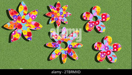 Silhouette di fiori, motivi, colorati e colorati, illustrazioni su sfondo verde alla luce del sole con ombre Foto Stock
