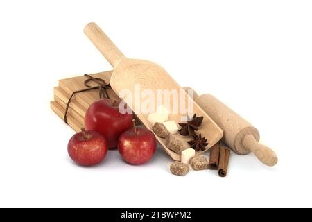 Bastoncini di cannella, cubetti di zucchero di canna e stelle di anice collocati in un misurino di legno vicino alle mele rosse e al matterello Foto Stock