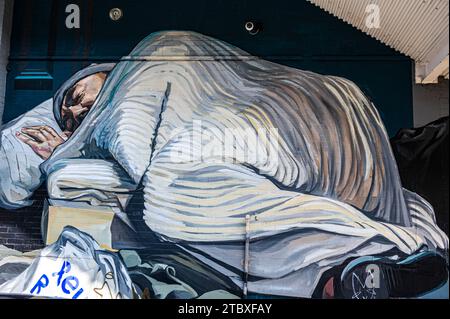 Murales senzatetto in una strada secondaria a Brighton Foto Stock