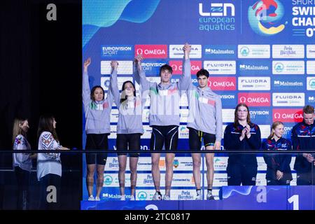 Miressi Alessandro, Zazzeri Lorenzo, Nocentini Jasmine e di Pietro Silvia, Italia ai LEN Short Course European Championships 2023 il 9 dicembre 2023 a Otopeni, Romania - foto Mihnea Tatu/LightSpeed Images/DPPI Credit: DPPI Media/Alamy Live News Foto Stock