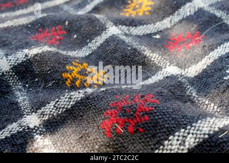 primo piano del tappeto in lana intrecciata a mano Foto Stock