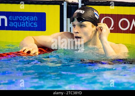 Otopeni, Romania. 10 dicembre 2023. OTOPENI, ROMANIA - 10 DICEMBRE: Koen de Groot dei Paesi Bassi si occupa della finale maschile dei 50 m breaststroke durante i campionati europei di nuoto a corto raggio del 2023, il 10 dicembre 2023, a Otopeni, in Romania. (Foto di Nikola Krstic/BSR Agency) credito: BSR Agency/Alamy Live News Foto Stock