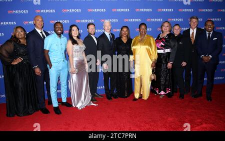 New York City, USA. 10 dicembre 2023. Yasmine Arrington Brook, Dr. Kwane Stewart, Osei Boateng, Estefania Rebellon, Adam Pearce, Mama Shu, Tescha Hawley, Stacey Buckner, Mike Goldberg e Alvin Irby hanno partecipato al 17° tributo annuale della CNN Heroes All-Star tenutosi al Museum of Natural History il 10 dicembre 2023 a New York City, NY © Steven Bergman/AFF-USA.COM Credit: AFF/Alamy Live News Foto Stock