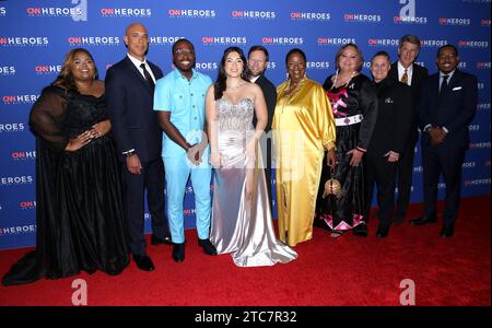 New York City, USA. 10 dicembre 2023. Yasmine Arrington Brook, Dr. Kwane Stewart, Osei Boateng, Estefania Rebellon, Adam Pearce, Mama Shu, Tescha Hawley, Stacey Buckner, Mike Goldberg e Alvin Irby hanno partecipato al 17° tributo annuale della CNN Heroes All-Star tenutosi al Museum of Natural History il 10 dicembre 2023 a New York City, NY © Steven Bergman/AFF-USA.COM Credit: AFF/Alamy Live News Foto Stock