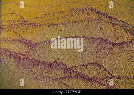 Sabbia di Portopalo di Capo Passero, splendida località balneare in provincia di Siracusa. Visitare Portopalo significa tuffarsi nell'azzurro di due mari, Foto Stock
