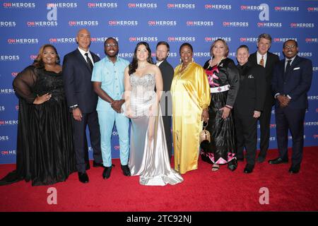 New York, USA, 10 dicembre 2023 - (L-R) Yasmine Arrington Brook, Dr. Kwane Stewart, Osei Boateng, Estefania Rebellon, Adam Pearce, Mama Shu, Tescha Hawley, Stacey Buckner, Mike Goldberg e Alvin Irby hanno partecipato al 17° annuale CNN Heroes 2023 Today al Museum of Natural History di New York. Foto: Giada Papini Rampelotto/EuropaNewswire solo per uso editoriale. Non per USO commerciale! Foto Stock