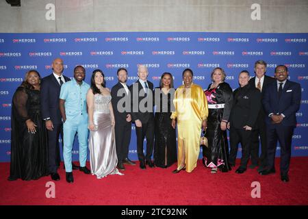 New York, USA, 10 dicembre 2023 - (L-R) Yasmine Arrington Brook, Dr. Kwane Stewart, Osei Boateng, Estefania Rebellon, Adam Pearce, Mama Shu, Tescha Hawley, Stacey Buckner, Mike Goldberg e Alvin Irby hanno partecipato al 17° annuale CNN Heroes 2023 Today al Museum of Natural History di New York. Foto: Giada Papini Rampelotto/EuropaNewswire solo per uso editoriale. Non per USO commerciale! Foto Stock