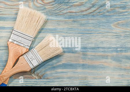 Concetto di costruzione di pennello su pannelli di legno Foto Stock