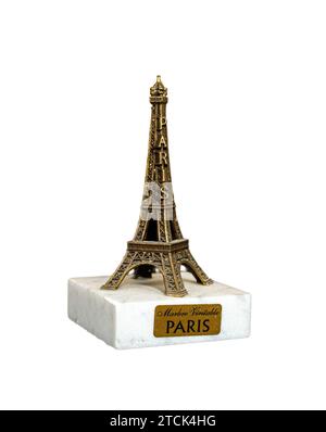 Sfondo bianco statuetta della Torre Eiffel di Parigi in miniatura Foto Stock