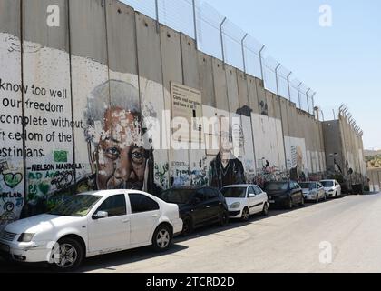 Murales sulla barriera di sicurezza israeliana a Betlemme, Palestina. Foto Stock