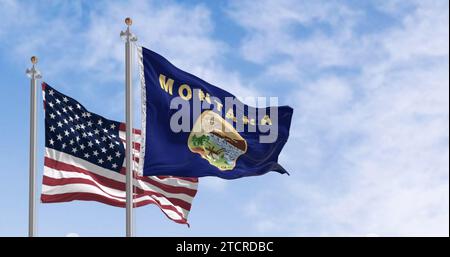 Bandiera dello stato del Montana che sventola al vento con la bandiera americana in una giornata limpida. Bandiera di stato DEGLI STATI UNITI. Patriottismo e orgoglio nazionale. rendering dell'illustrazione 3d. RIP Foto Stock