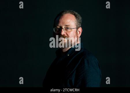 Scrittore scozzese Stuart MacBride assiste un photocall durante l'Edinburgh International Book Festival il 12 agosto 2017 a Edimburgo, Scozia. Foto Stock