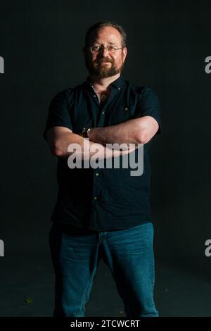 Scrittore scozzese Stuart MacBride assiste un photocall durante l'Edinburgh International Book Festival il 12 agosto 2017 a Edimburgo, Scozia. Foto Stock