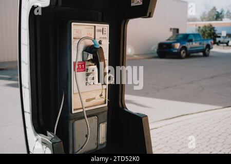 Telefono a pagamento rotto nel centro di caro Michigan, USA Foto Stock