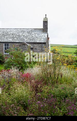 Cottage e giardino. Cregneash, Isola di Man, Regno Unito. Foto Stock