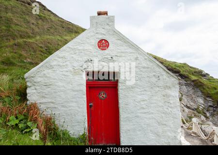 Cottage dei pescatori a Niarbyl. Isola di Man, Regno Unito. Foto Stock