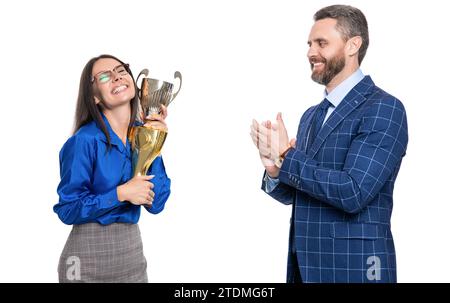 Successo aziendale. Due uomini d'affari in riunione di successo isolati su bianco. Donna d'affari di successo, uomo in tuta, regge la Champion Cup. Busine Foto Stock