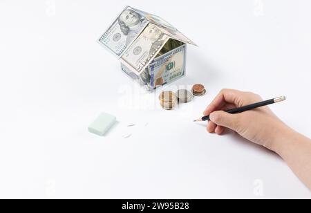 casa fatta di dollari, sfondo bianco, disegno a mano, mock-up Foto Stock