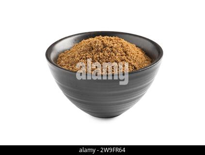 Ciotola di carvi aromatici (cumino persiano) in polvere isolata su bianco Foto Stock