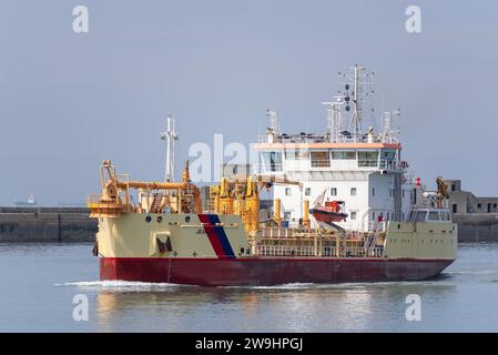 Le Havre, Francia - Hopper Dredger JEAN ANGO nel porto di le Havre. Foto Stock