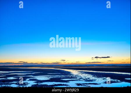 Tramonto sulla spiaggia Foto Stock