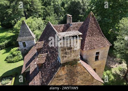 Manoir de la Salle (XV secolo) a Saint-Léon-sur-Vézère. Composto da un maniero e da un castello quadrato con una torre angolare, il maniero di la Salle è localizzato Foto Stock