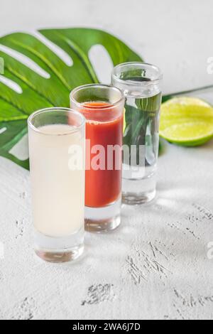 Bandera cocktail - shot di sangrita, tequila e succo di lime Foto Stock